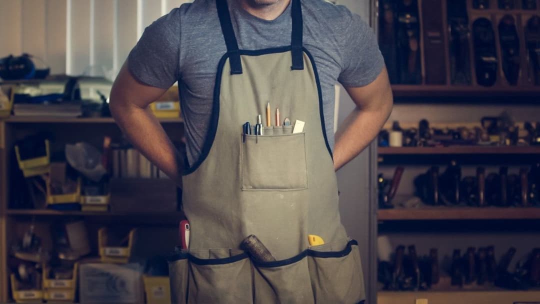 Small business owner with an apron on 