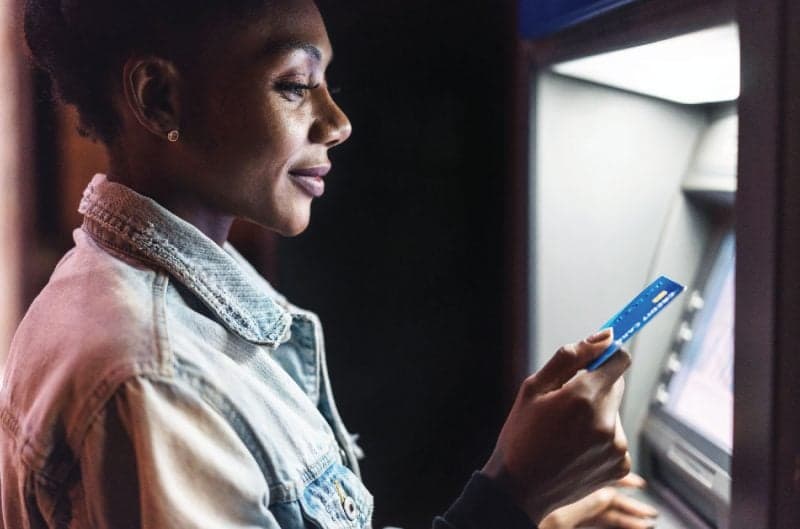 inserting card into atm machine 