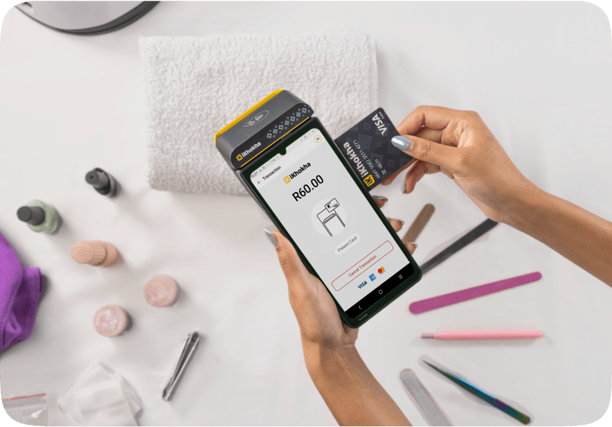 Woman in store accepting card payments with an iK Flyer Device