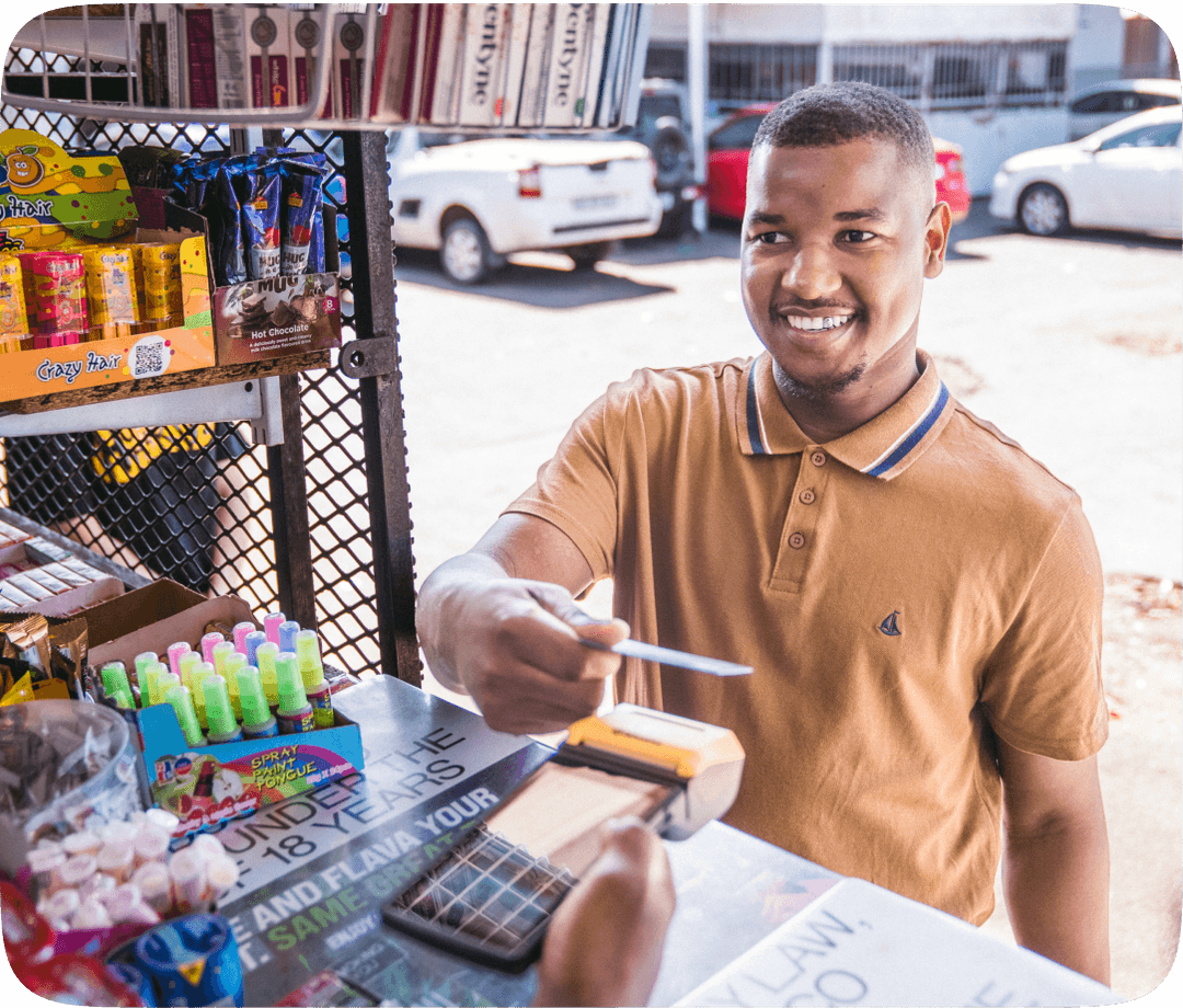 Man buying from tuck shop